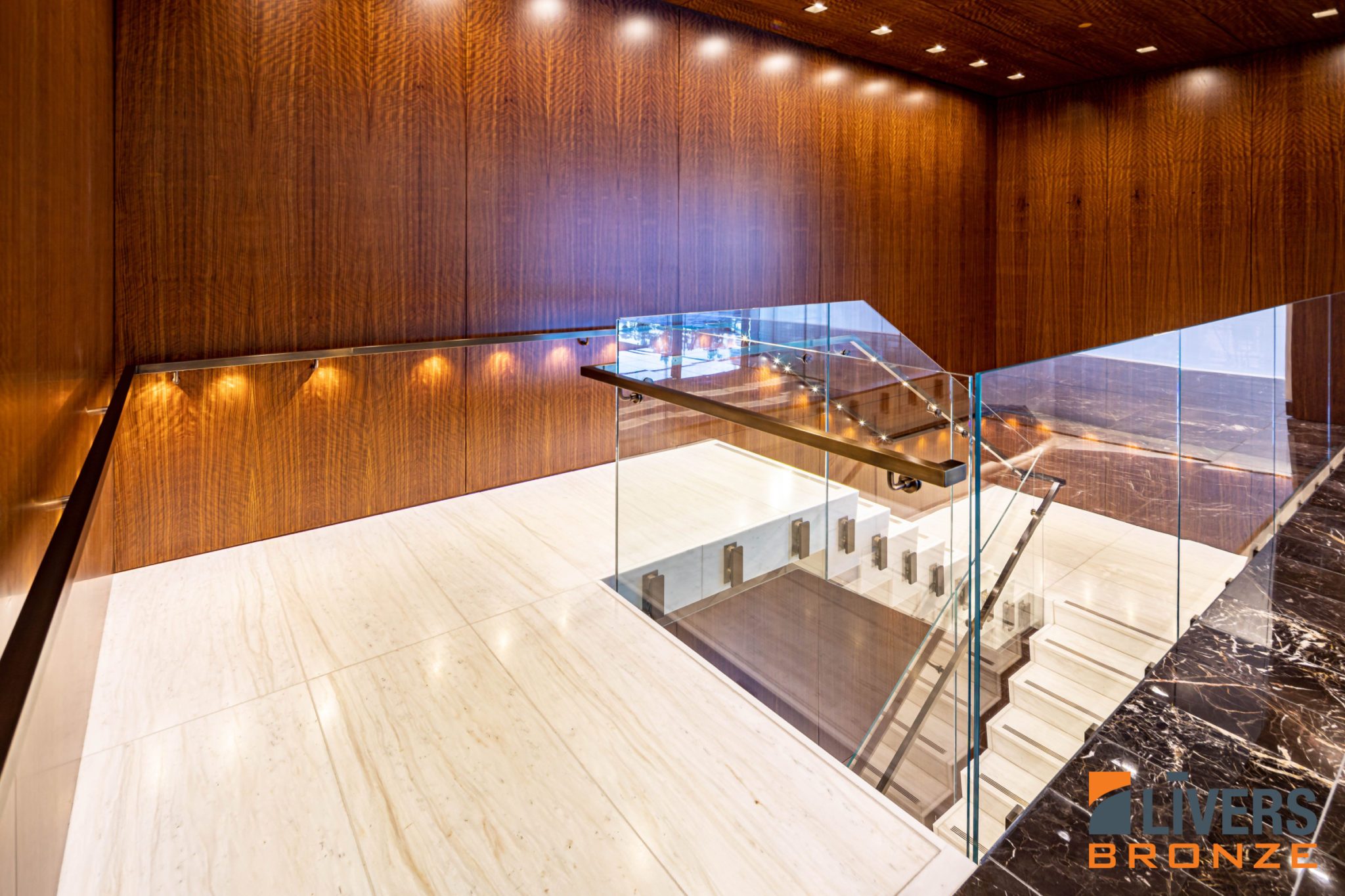 Livers Bronze Blok Commercial Glass Railing installed in the lobby of the Trammell Crow Center in downtown Dallas Texas and is made in the USA