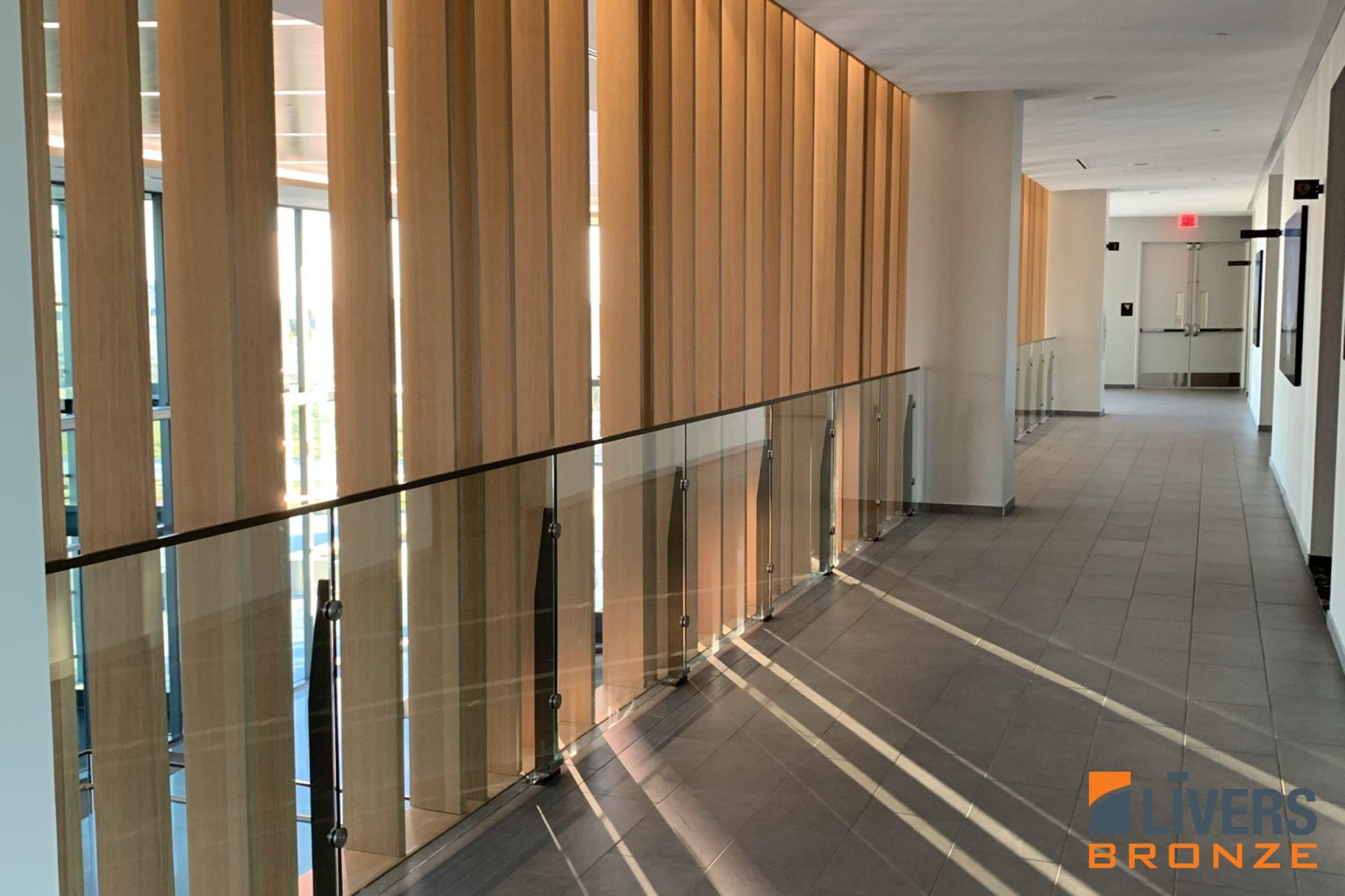 Livers Bronze Belmont Stainless Steel Railings with Powder Coated Railing Posts were installed at the office lobby stairs at Sammons Financial Headquarters, Des Moines, Iowa, and were Made in the USA.
