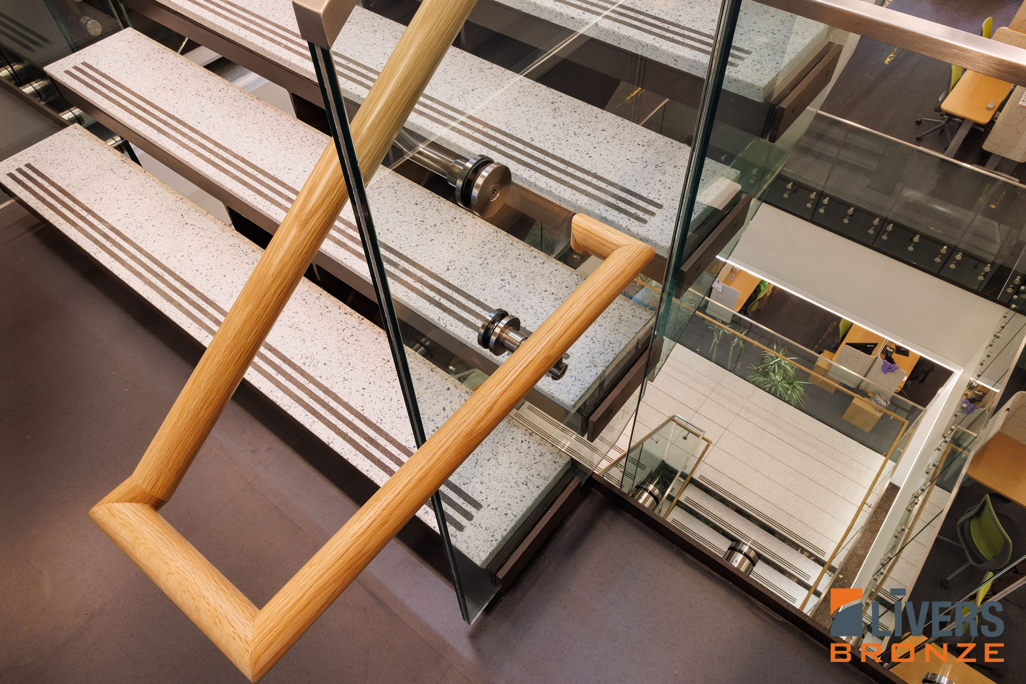 Livers Bronze Button Glass Railing System was installed at the lobby stairway at Lehigh University's Health, Science & Technology Building and is Made in the USA.