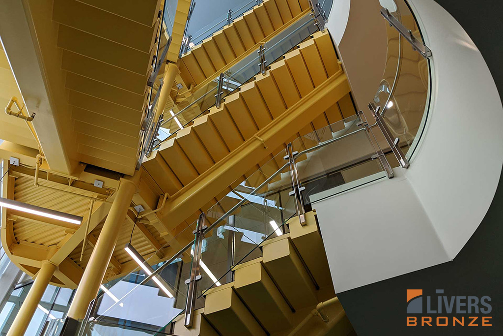 Livers Bronze Icon Glass Railings with laminated glass and Stainless Steel Railings were installed at the Lobby Stairs at the Student Library at the University of Central Florida and were made in the USA.