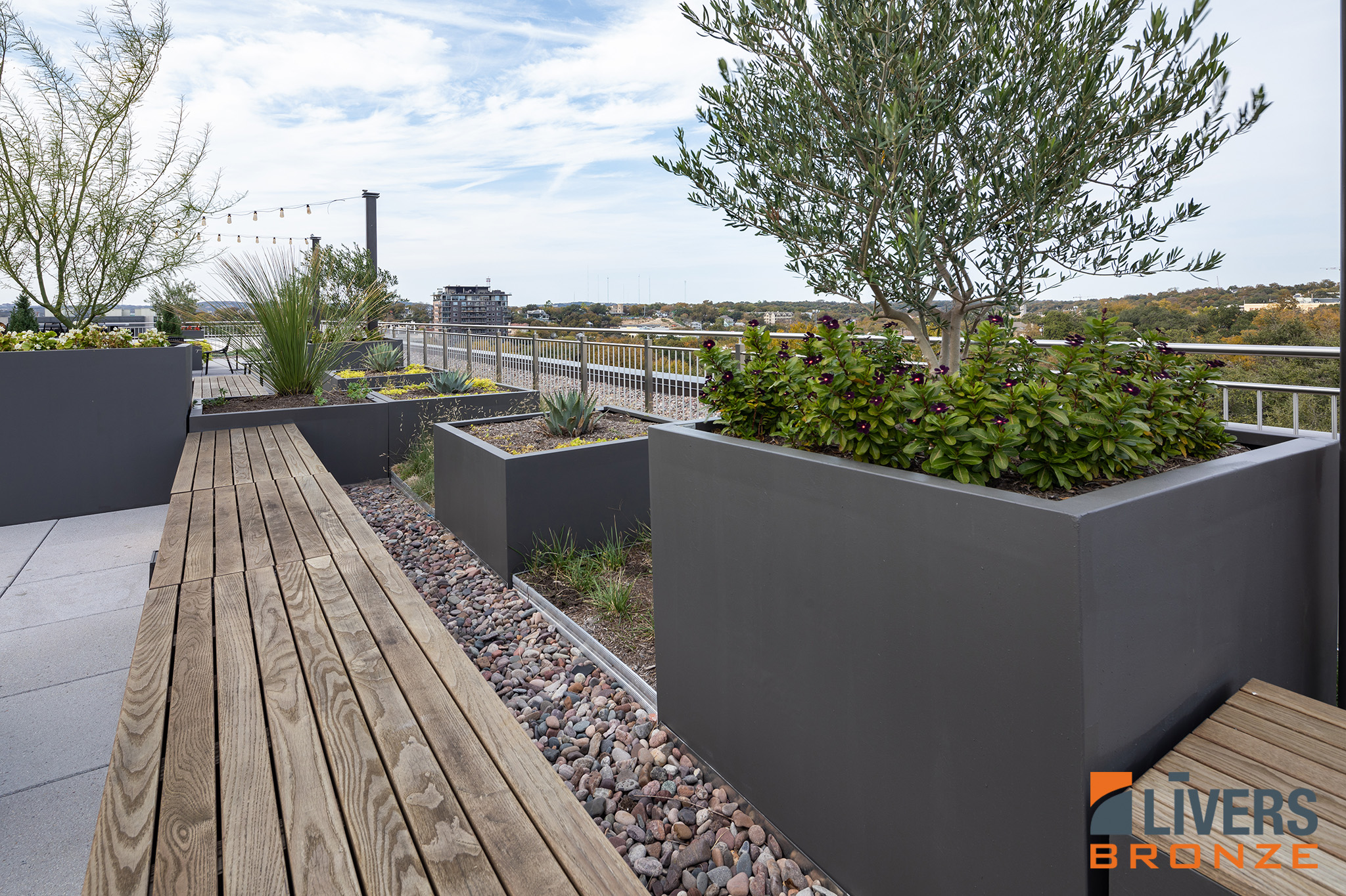 Livers Bronze Mirage with Stainless Steel Picket Railings were installed on the Rooftop deck at an office building in Austin, Texas, and were made in the USA.