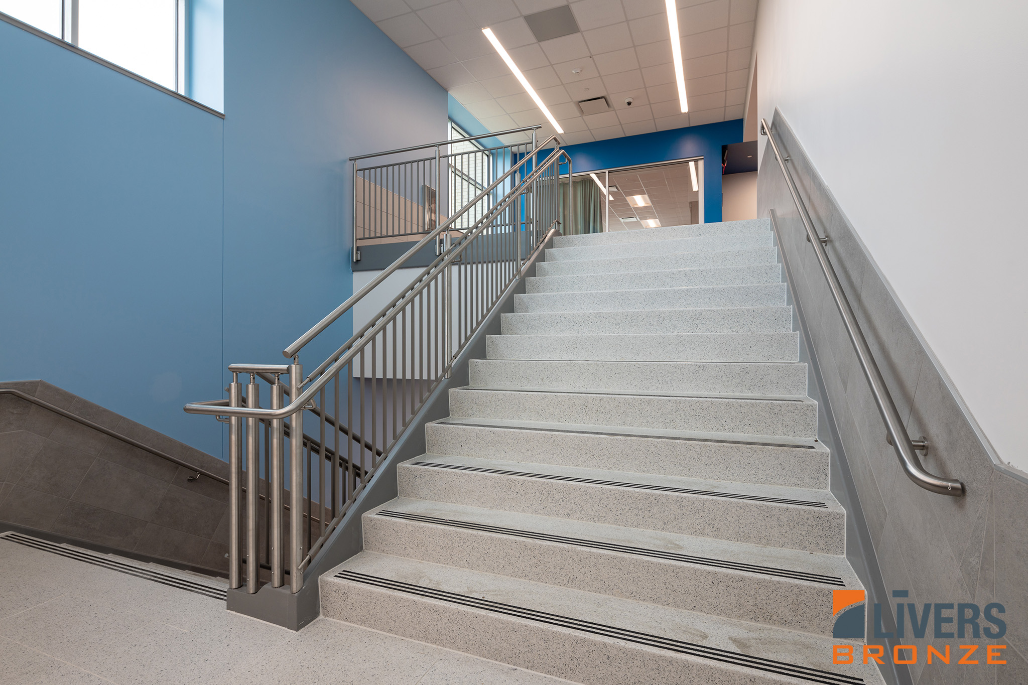 Livers Bronze Mirage with Stainless Steel Picket Railings were installed in the interior stairway at Red Bud Elementary School, Austin, Texas, and are Made in the USA.