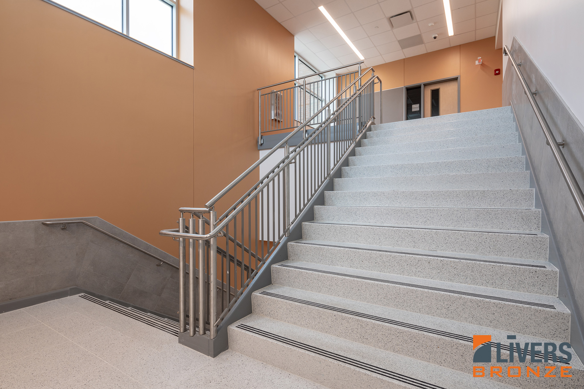 Livers Bronze Mirage with Stainless Steel Picket Railings were installed in the interior stairway at Red Bud Elementary School, Austin, Texas, and are Made in the USA