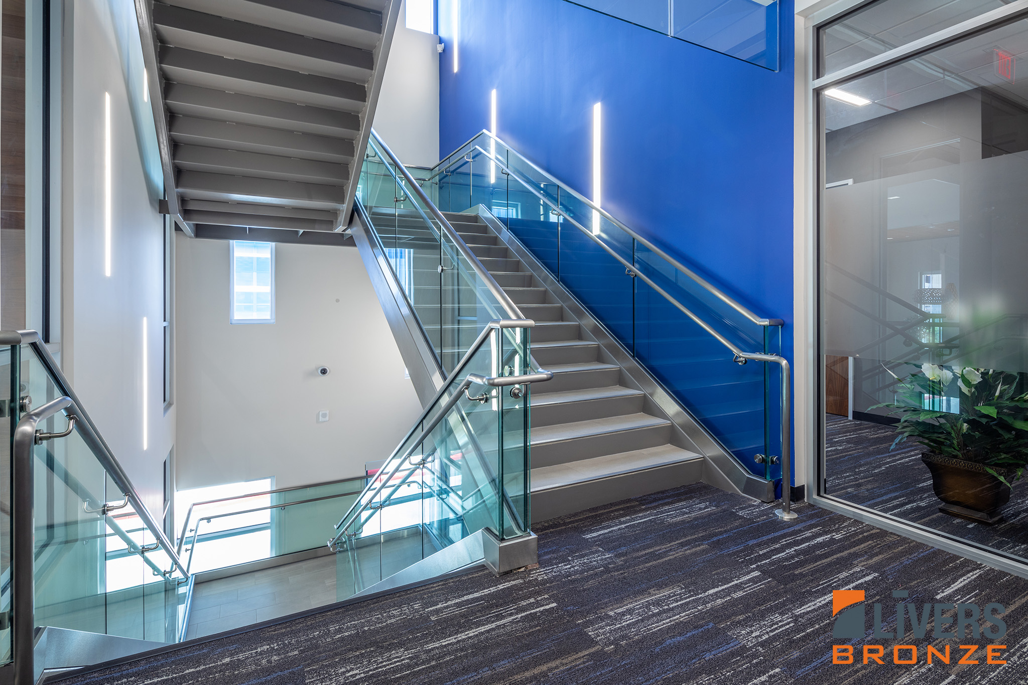 Livers Bronze Struct-U-Rail Commercial Glass Railing installed in San Antonio Independent School District Central Office Building is Made in the USA