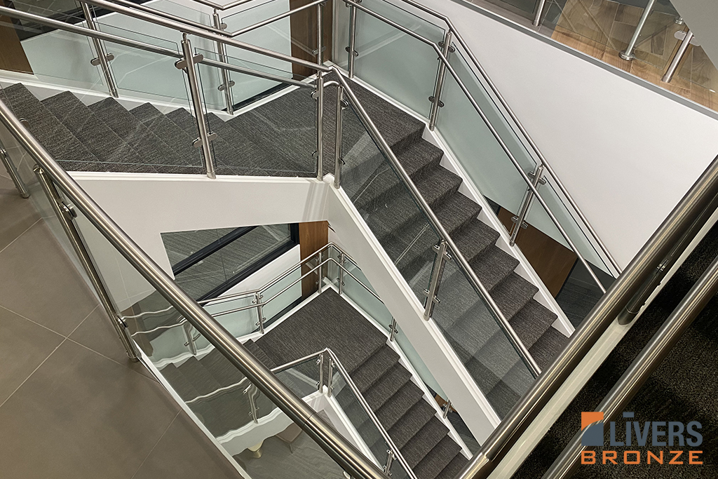 Livers Bronze Mirage glass railings were installed in the interior stairways at the headquarters office for Ohio Rural Electric Cooperatives, Columbus, Ohio, and were Made in the USA.
