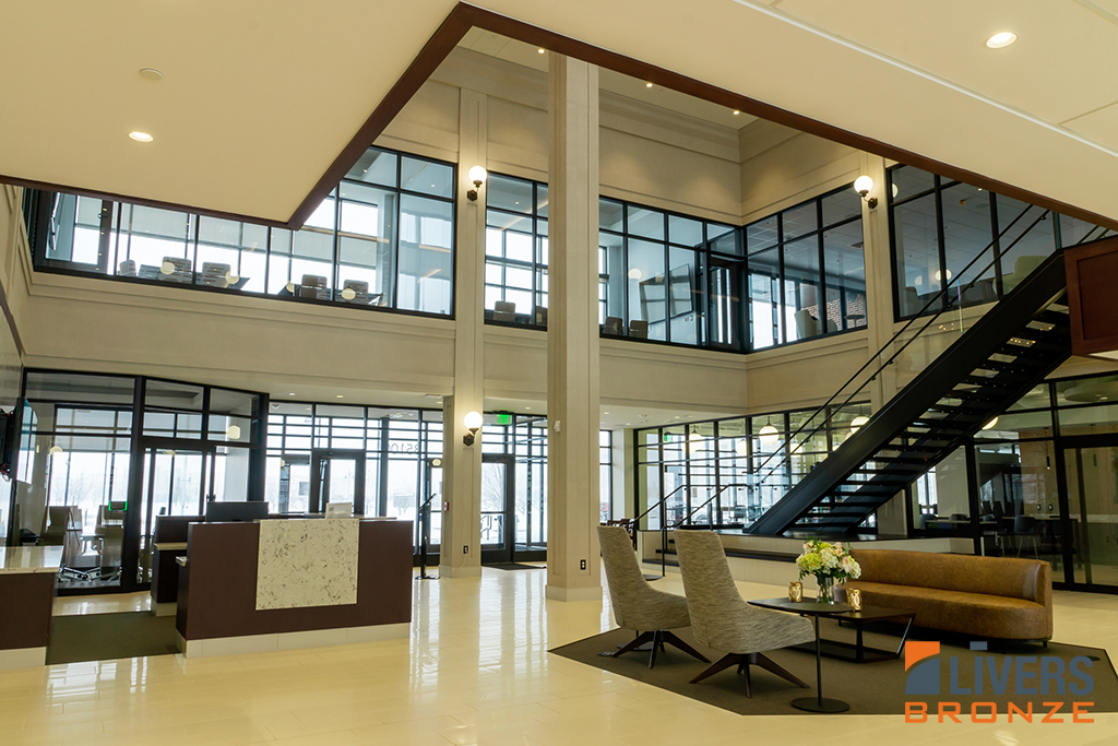 Livers Bronze Struct-U-Rail glass railings were installed at the lobby stair and interior balcony at Christian Financial Group, Sterling Heights, Mich., and were Made in the USA.