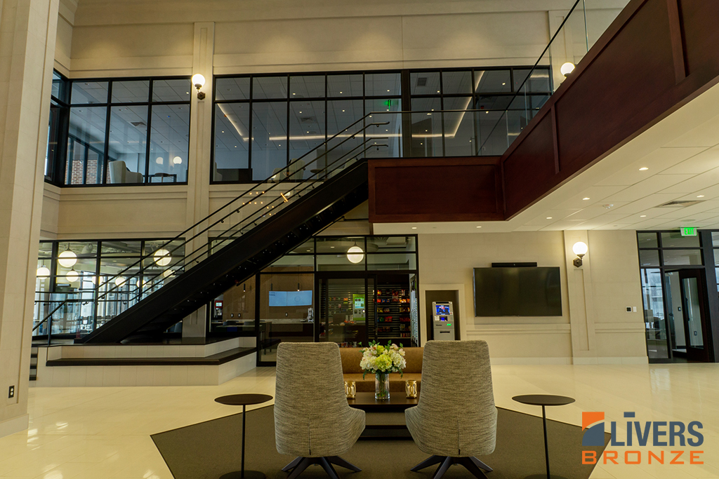 Livers Bronze Struct-U-Rail glass railings were installed at the lobby stair and interior balcony at Christian Financial Group, Sterling Heights, Mich., and were Made in the USA.